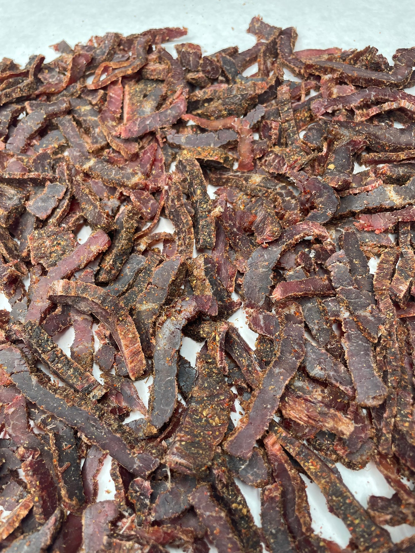 THE SHARER - CHILLI BILTONG - SLICED STEAKS